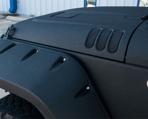 Image of Jeep that had black Kevlar/Raptor coating applied to the body at Accelerate Auto Repair in Rowlett Tx.