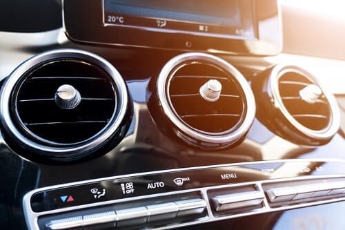 Stay Out of the Hot Seat with A/C Service and Repair at Accelerate Auto Repair in Rowlett Tx image of ac vents on car dashboard